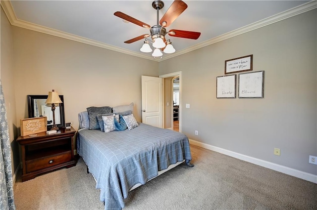 carpeted bedroom featuring ceiling fan and ornamental molding