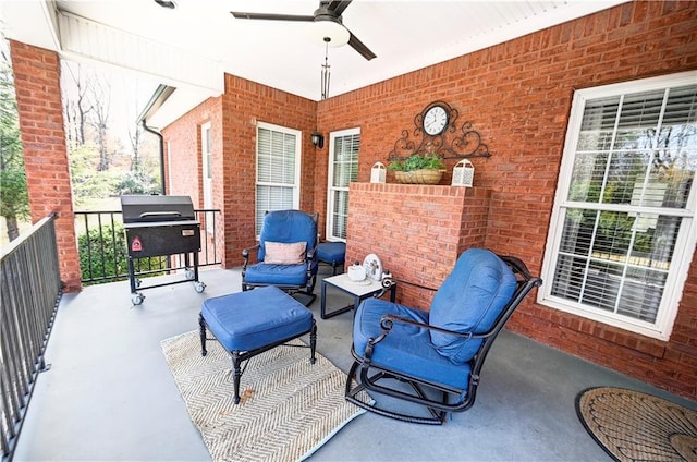 view of patio / terrace featuring a grill and ceiling fan