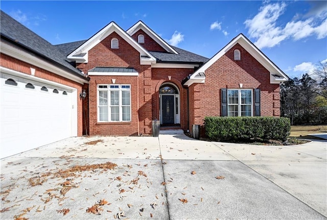 view of front of property with a garage