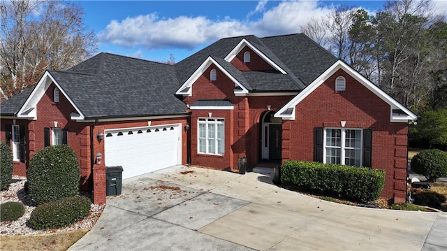 view of front of property with a garage