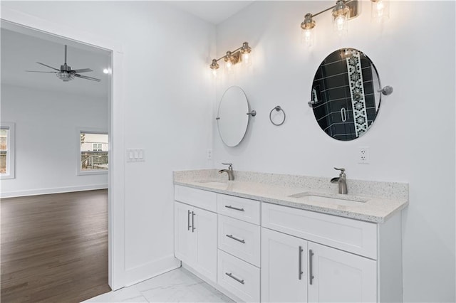 bathroom featuring vanity and ceiling fan