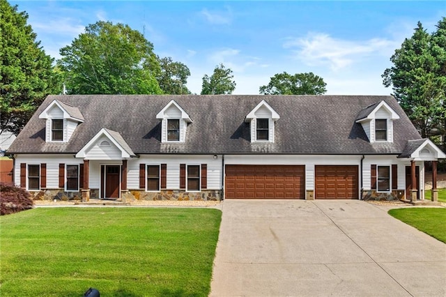 150 S St S, Buford, GA 30518 - cape cod-style house with stone siding, a garage, driveway, a front yard, and roof with shingles