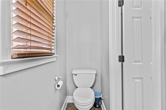 150 S St S, Buford, GA 30518 - bathroom featuring baseboards, toilet, and tile patterned flooring