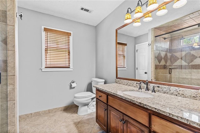 150 S St S, Buford, GA 30518 - full bathroom with vanity, toilet, a stall shower, tile patterned floors, and baseboards