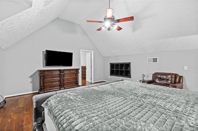150 S St S, Buford, GA 30518 - bedroom featuring wood finished floors, vaulted ceiling, a textured ceiling, baseboards, and a ceiling fan