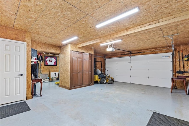 150 S St S, Buford, GA 30518 - garage featuring a garage door opener