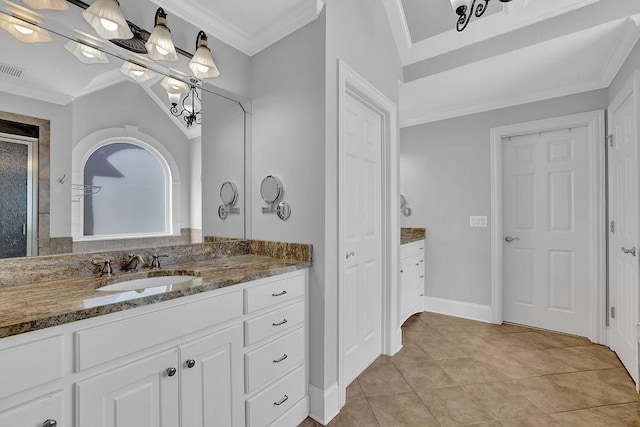 bathroom with vanity, tile patterned floors, and ornamental molding