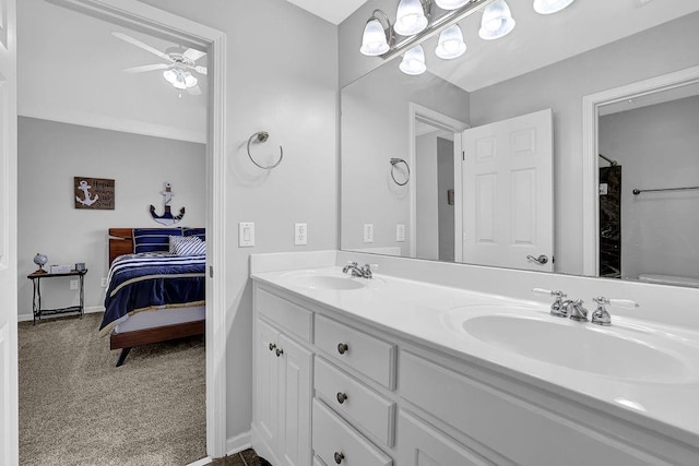 bathroom featuring vanity and ceiling fan