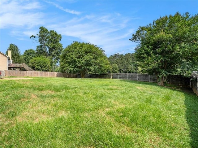 view of yard with fence