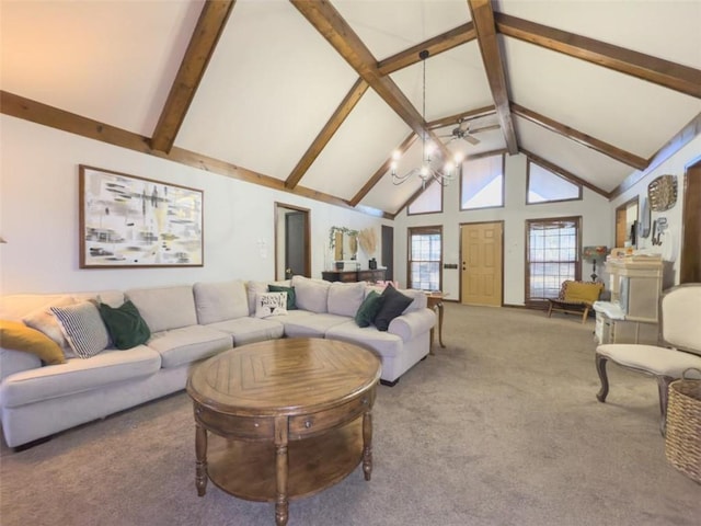 carpeted living room with beamed ceiling, a notable chandelier, and high vaulted ceiling