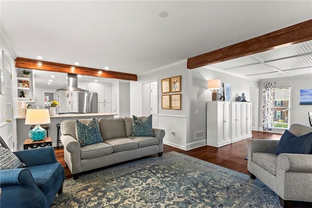 living room with beam ceiling, visible vents, baseboards, recessed lighting, and wood finished floors