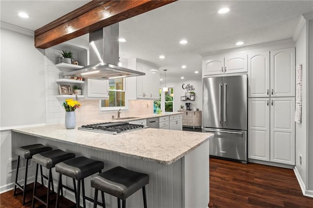 kitchen featuring stainless steel appliances, a peninsula, recessed lighting, island range hood, and open shelves