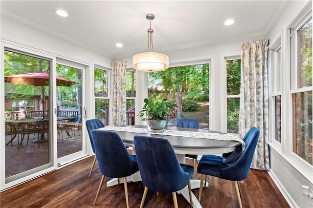 dining room with recessed lighting, dark wood-style floors, and ornamental molding