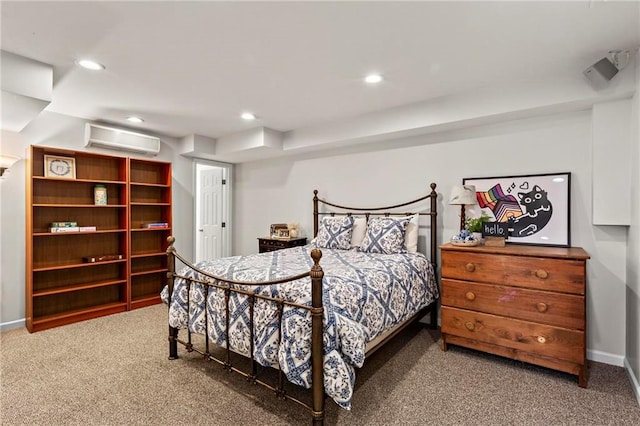 carpeted bedroom with baseboards, an AC wall unit, and recessed lighting