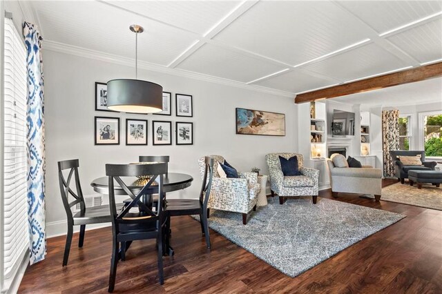 living room with a fireplace, wood finished floors, baseboards, and ornamental molding