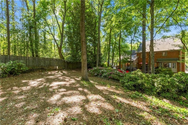 view of yard with fence