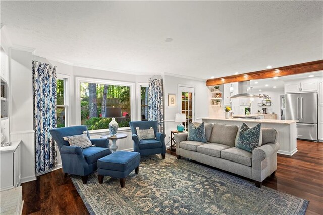 living room featuring recessed lighting, dark wood-type flooring, and crown molding
