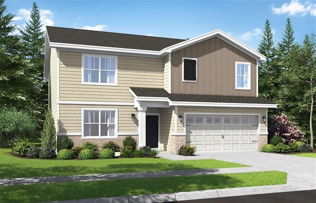 view of front of home featuring a front yard and a garage