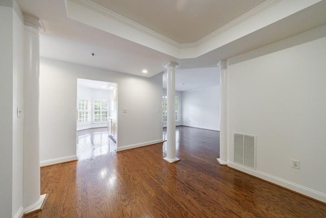 50 Biscayne Dr Unit 2106, Atlanta, GA 30309 - unfurnished room with decorative columns, wood finished floors, crown molding, baseboards, and recessed lighting