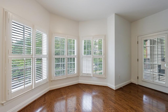 50 Biscayne Dr Unit 2106, Atlanta, GA 30309 - unfurnished room with baseboards and wood finished floors