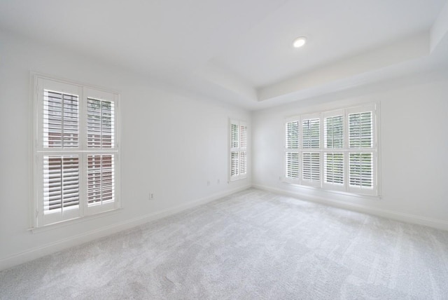 50 Biscayne Dr Unit 2106, Atlanta, GA 30309 - carpeted spare room with baseboards, a raised ceiling, and recessed lighting