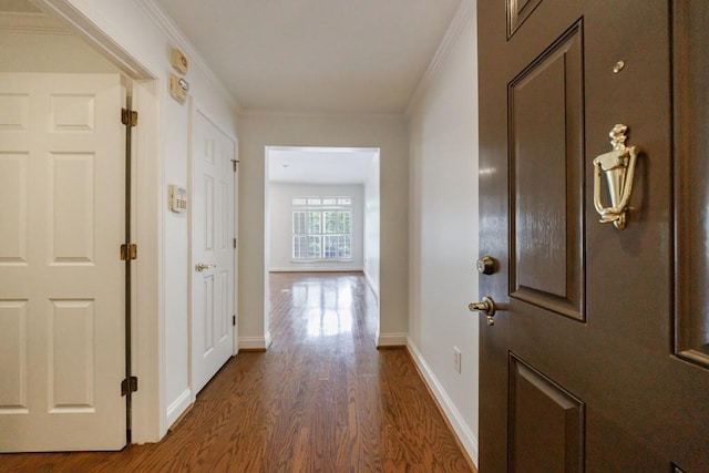 50 Biscayne Dr Unit 2106, Atlanta, GA 30309 - corridor featuring dark wood-style floors, ornamental molding, and baseboards