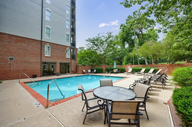 50 Biscayne Dr Unit 2106, Atlanta, GA 30309 - community pool featuring a patio area