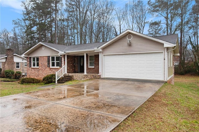 single story home featuring a garage and a front yard