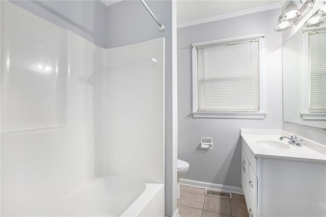 full bathroom featuring tile patterned floors, toilet, crown molding, tub / shower combination, and vanity