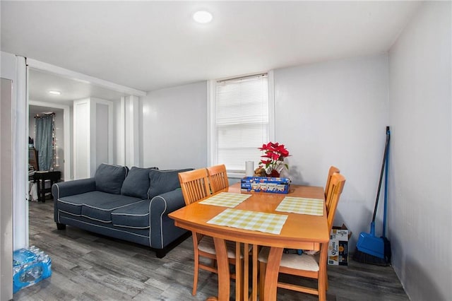dining room with dark wood-type flooring