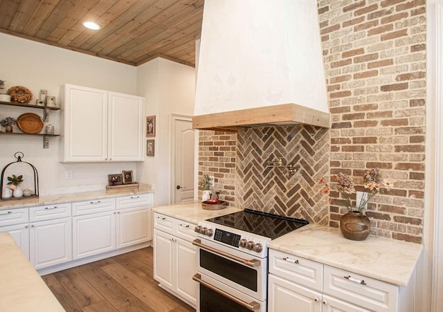 kitchen featuring white cabinetry, open shelves, electric stove, and tasteful backsplash