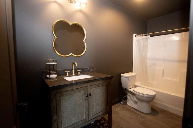 bathroom with shower / bath combo with shower curtain, toilet, and vanity