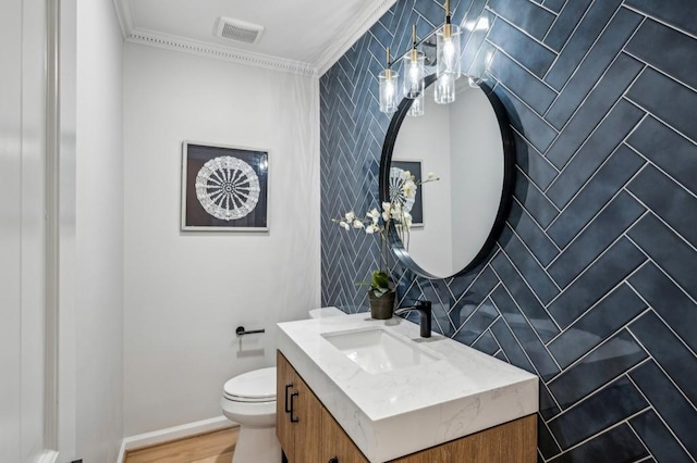 6124 Kings Mountain Ct, Stone Mountain, GA 30087 - bathroom with tile walls, visible vents, toilet, and vanity