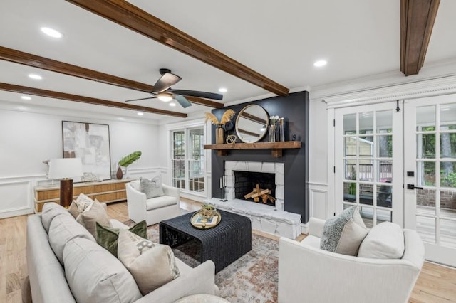 6124 Kings Mountain Ct, Stone Mountain, GA 30087 - living area with a decorative wall, french doors, ceiling fan, and beamed ceiling
