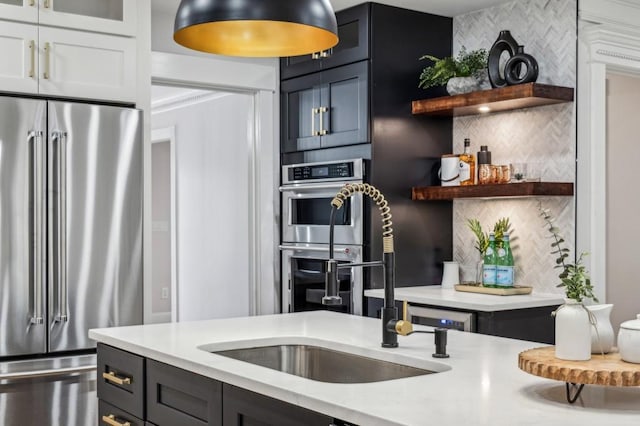 6124 Kings Mountain Ct, Stone Mountain, GA 30087 - kitchen featuring light countertops, stainless steel appliances, glass insert cabinets, open shelves, and backsplash