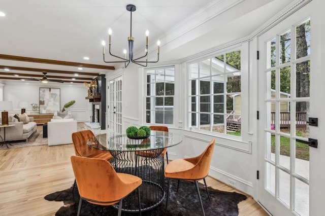 6124 Kings Mountain Ct, Stone Mountain, GA 30087 - interior space with beamed ceiling, ornamental molding, wood finished floors, recessed lighting, and ceiling fan with notable chandelier