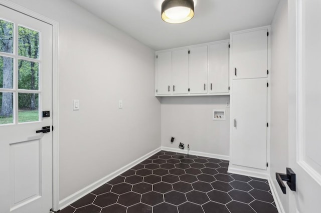 6124 Kings Mountain Ct, Stone Mountain, GA 30087 - washroom with baseboards, hookup for an electric dryer, cabinet space, and hookup for a washing machine