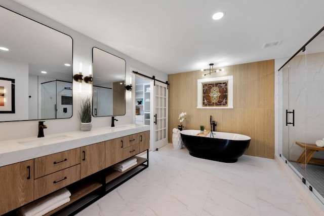 6124 Kings Mountain Ct, Stone Mountain, GA 30087 - full bathroom with marble finish floor, a sink, a shower stall, and a freestanding bath