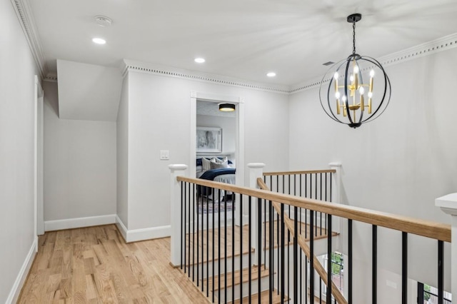 6124 Kings Mountain Ct, Stone Mountain, GA 30087 - corridor featuring a notable chandelier, an upstairs landing, light wood-style flooring, baseboards, and recessed lighting