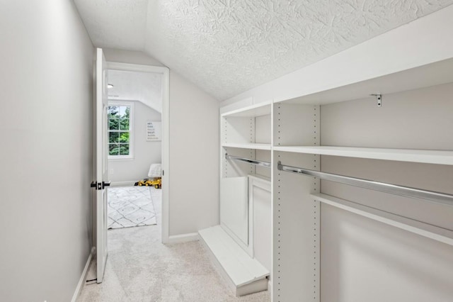 6124 Kings Mountain Ct, Stone Mountain, GA 30087 - spacious closet with vaulted ceiling and light colored carpet
