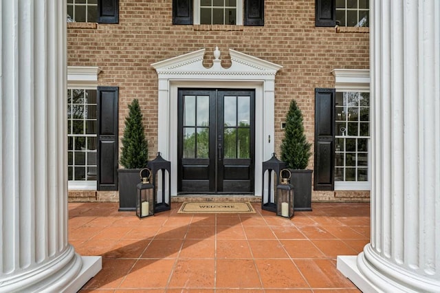 6124 Kings Mountain Ct, Stone Mountain, GA 30087 - entrance to property with french doors and brick siding