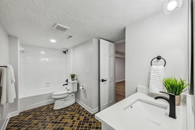 6124 Kings Mountain Ct, Stone Mountain, GA 30087 - full bath with toilet, shower / bathing tub combination, a textured ceiling, baseboards, and visible vents
