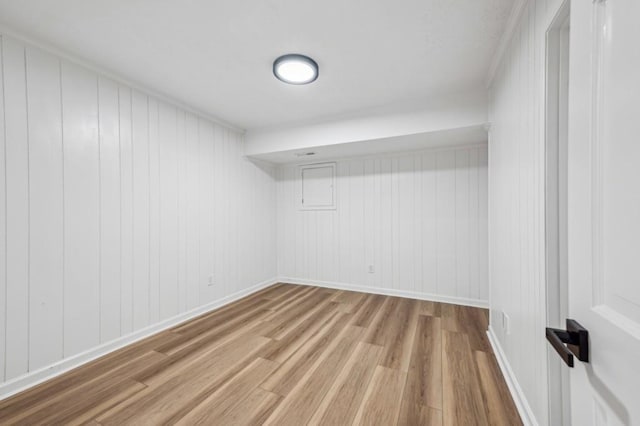 6124 Kings Mountain Ct, Stone Mountain, GA 30087 - empty room featuring baseboards and light wood-type flooring