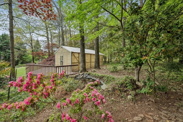 6124 Kings Mountain Ct, Stone Mountain, GA 30087 - view of yard featuring a wooden deck and a detached garage