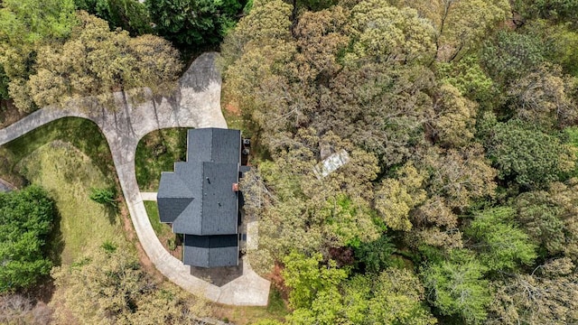 6124 Kings Mountain Ct, Stone Mountain, GA 30087 - drone / aerial view with a wooded view