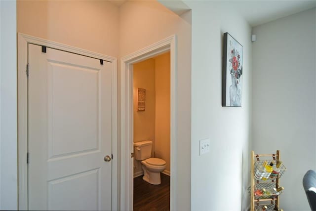 corridor featuring hardwood / wood-style flooring