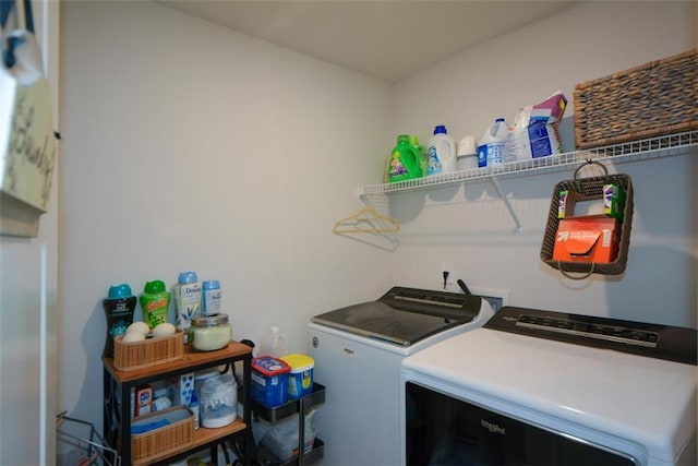 laundry room featuring separate washer and dryer