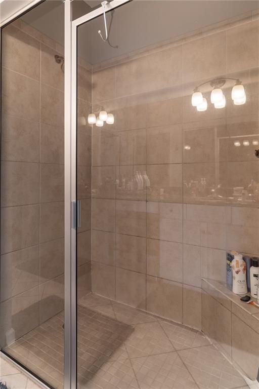 bathroom with a shower stall