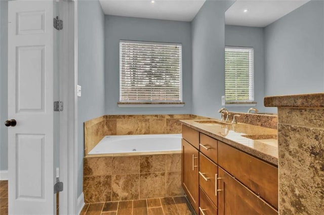 200 Renaissance Pkwy NE Unit 304, Atlanta, GA 30308 - full bathroom with a garden tub and double vanity