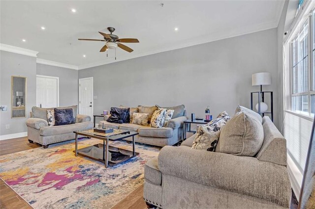 200 Renaissance Pkwy NE Unit 304, Atlanta, GA 30308 - living area featuring wood finished floors, crown molding, a ceiling fan, baseboards, and recessed lighting